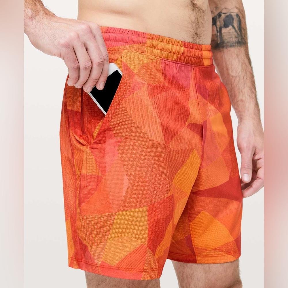 Lululemon men’s pace breaker unlined shorts 7” size large orange multi